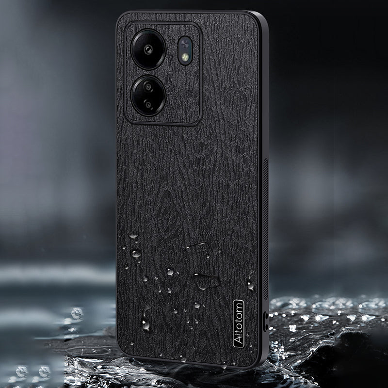 For Xiaomi Redmi 13C 4G / Poco C65 4G Wood Texture PU Leather Coated PC+TPU Cell Phone Case - Black