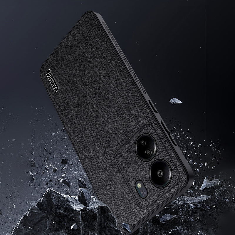 For Xiaomi Redmi 13C 4G / Poco C65 4G Wood Texture PU Leather Coated PC+TPU Cell Phone Case - Black