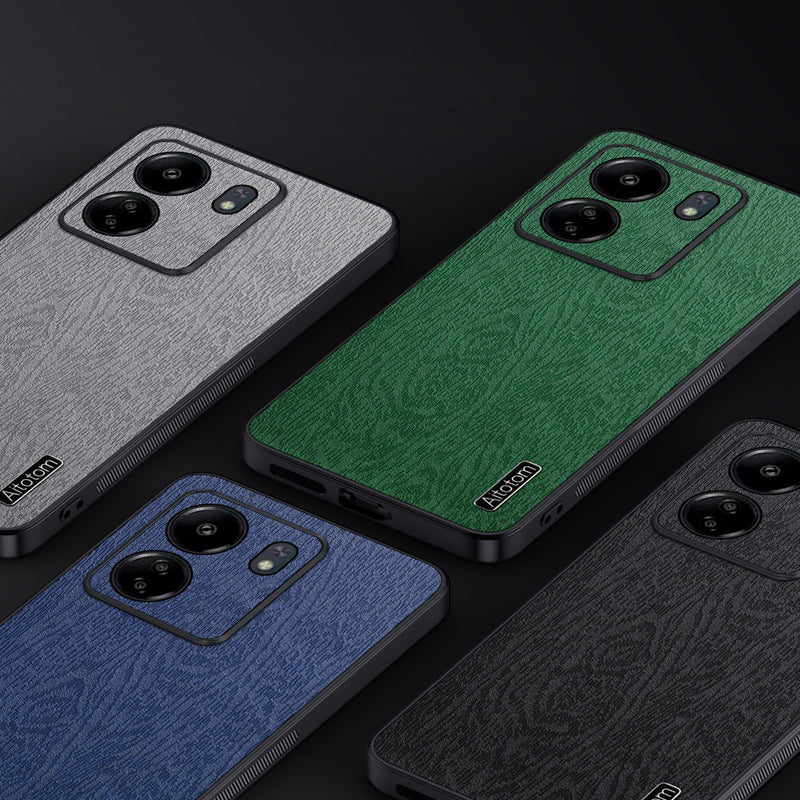 For Xiaomi Redmi 13C 4G / Poco C65 4G Wood Texture PU Leather Coated PC+TPU Cell Phone Case - Black