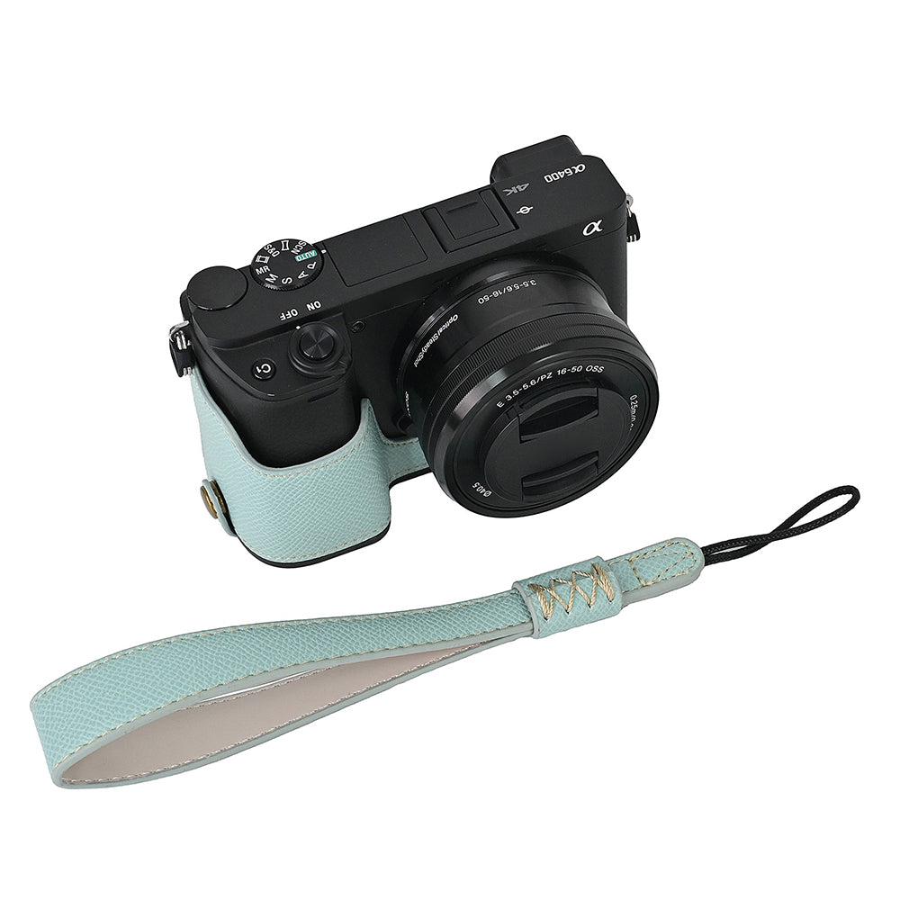 Camera Case for Sony A6400 / A6300 / A6100 / A6000 Battery Opening Design Palm Texture PU Leather Half Body Bottom Case with Wrist Strap
