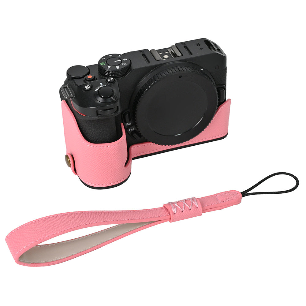 For Nikon Z30 / Z50 Battery Opening Design PU Leather Camera Cover Palm Texture Half Body Bottom Case with Wrist Strap
