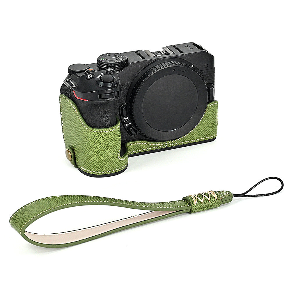 For Nikon Z30 / Z50 Battery Opening Design PU Leather Camera Cover Palm Texture Half Body Bottom Case with Wrist Strap