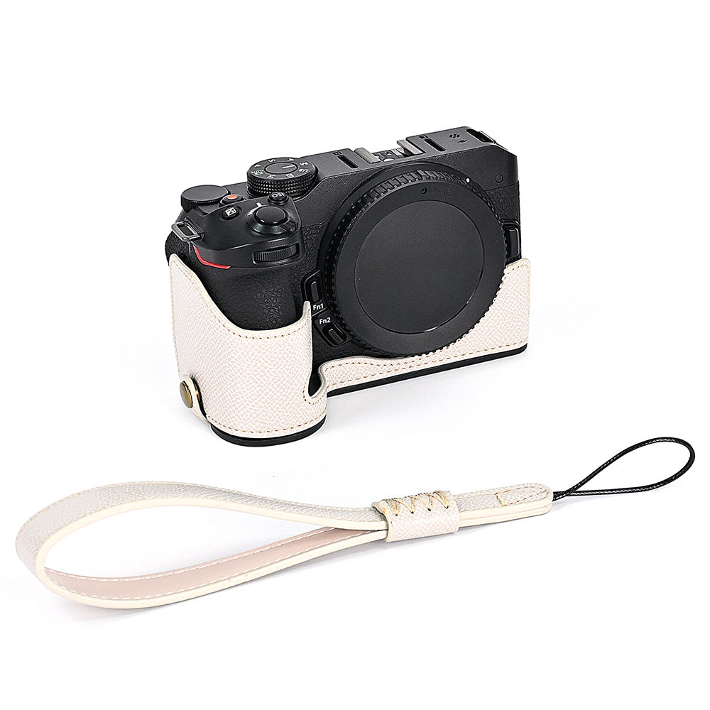 For Nikon Z30 / Z50 Battery Opening Design PU Leather Camera Cover Palm Texture Half Body Bottom Case with Wrist Strap