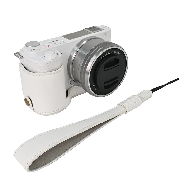 For Sony ZV-E10 Battery Opening Design PU Leather Camera Cover Half Body Bottom Case with Wrist Strap
