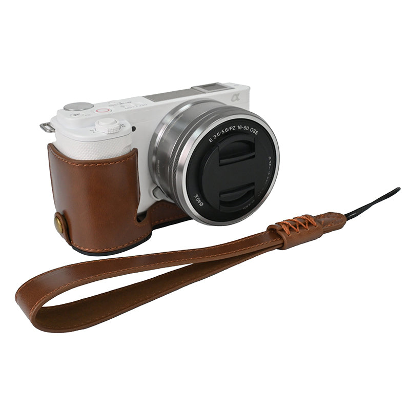 For Sony ZV-E10 Battery Opening Design PU Leather Camera Cover Half Body Bottom Case with Wrist Strap