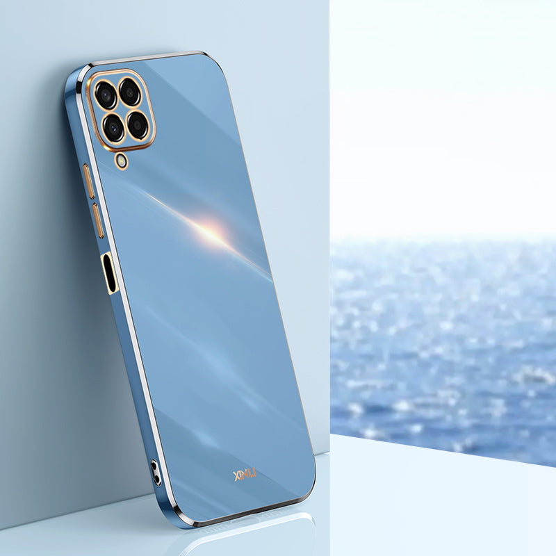 Pouzdro na telefon XINLI pro Samsung Galaxy M33 5G (globální verze) galvanické pokovování Golden Edge Back Protector TPU kryt