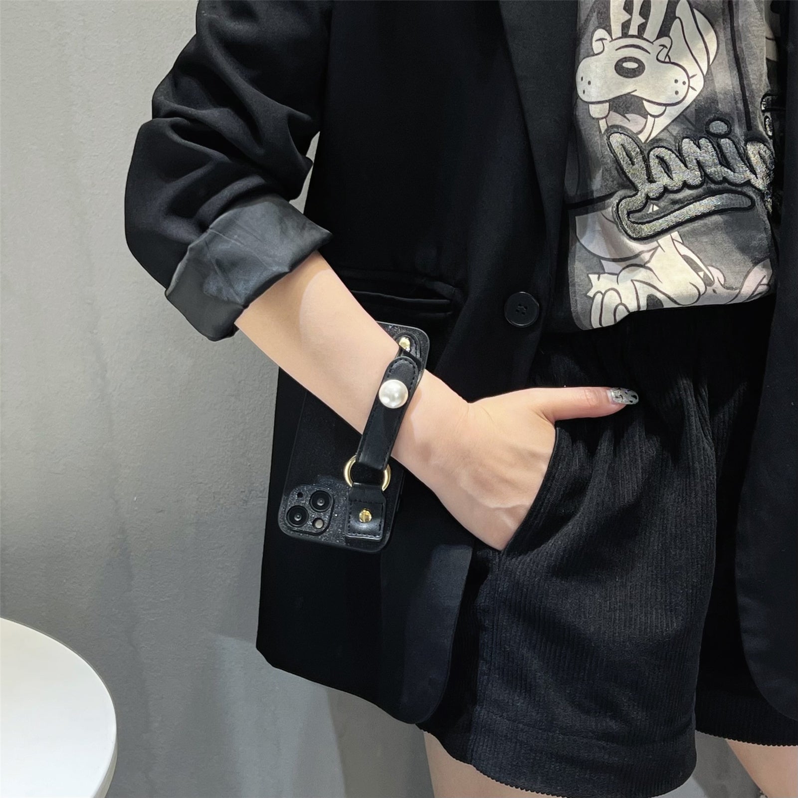 For iPhone 14 Dustproof Phone Case Pearl Decor Wristband Black PU Leather TPU Phone Cover Shell
