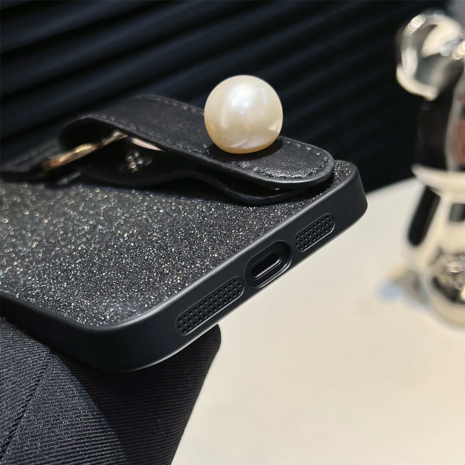 For iPhone 14 Dustproof Phone Case Pearl Decor Wristband Black PU Leather TPU Phone Cover Shell