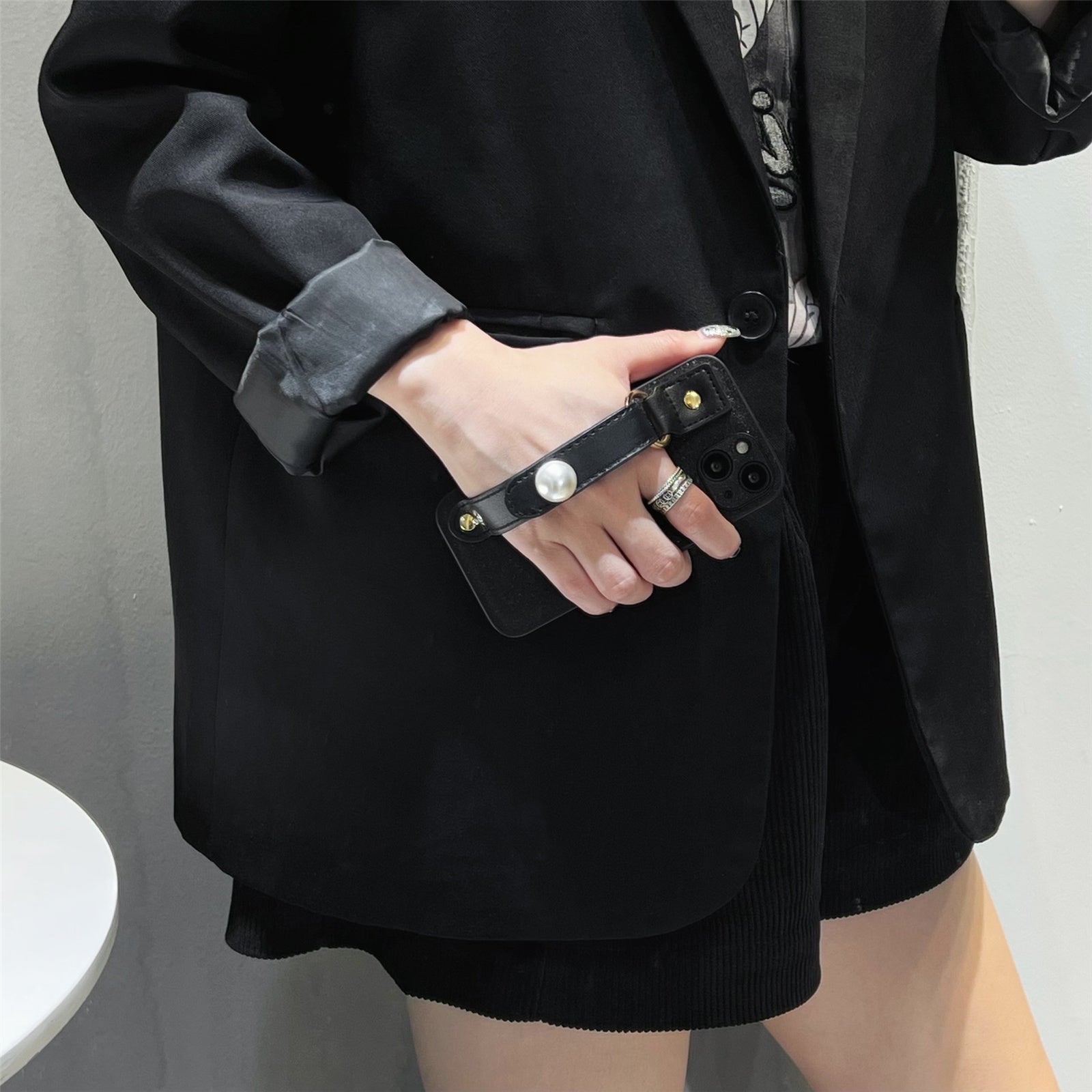 PU Leather TPU Phone Case for iPhone 14 Plus Pearl Decor Wristband Drop Protection Black Phone Back Shell